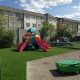 private play area with fake grass surface near toronto