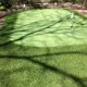 Golf green tucked into well garden landscaping