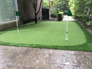 Great Side-yard Golf green that makes use of what would be considered unusable space.