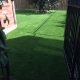 Nice entrance using artificial grass into the backyard
