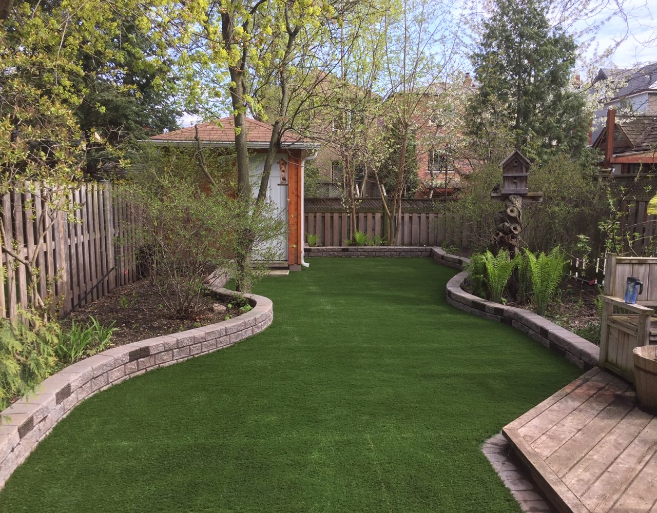 Curves look good but difficult to mow, artificial grass is the answer