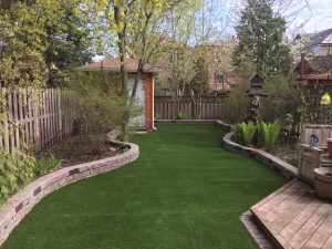Curves look good but difficult to mow, artificial grass is the answer
