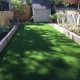 Perfectly landscaped gardens matches perfect artificial grass
