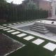 Artificial grass makes this Toronto backyard immaculate to match landscape