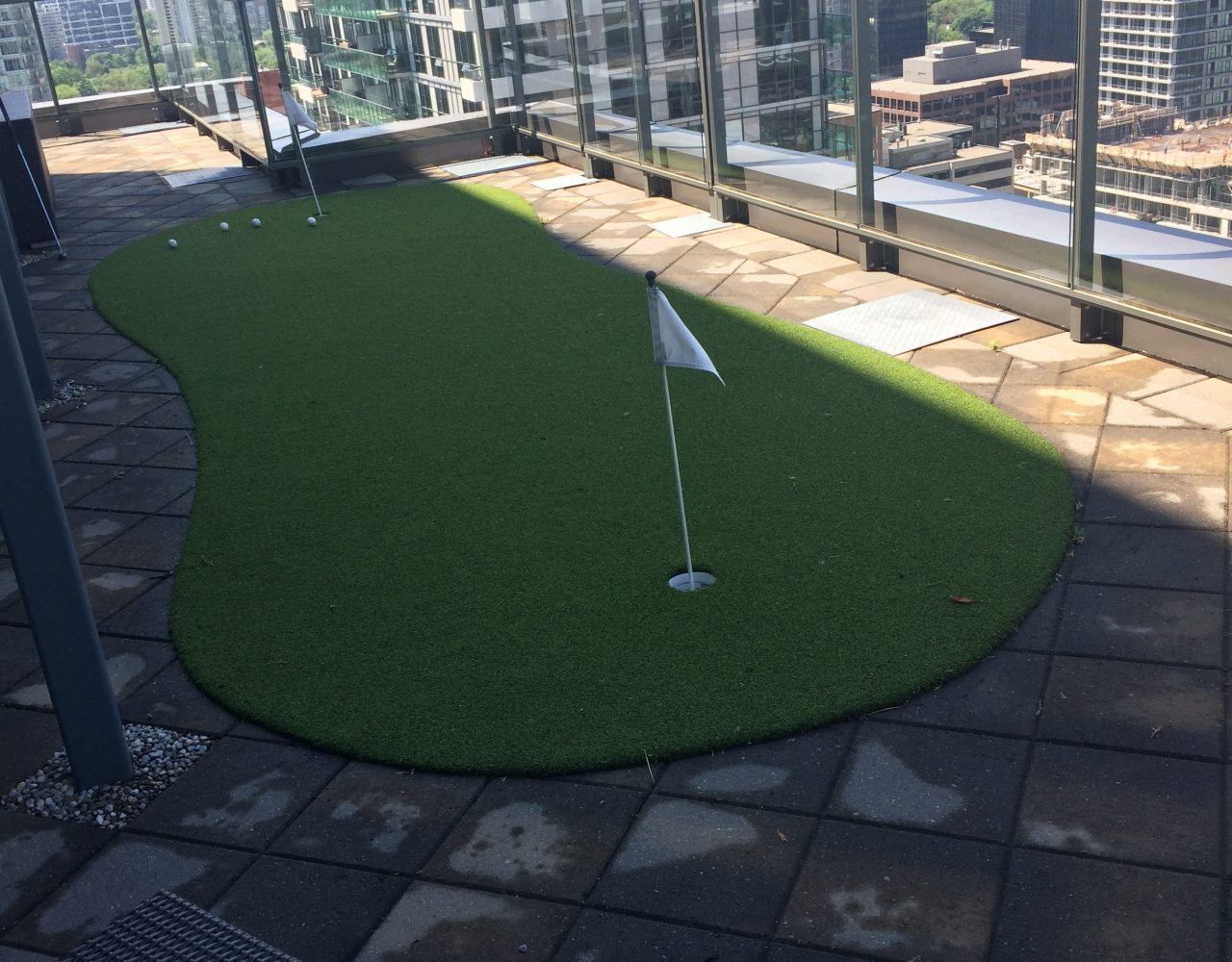 2-hole artificial golf green on balcony.-